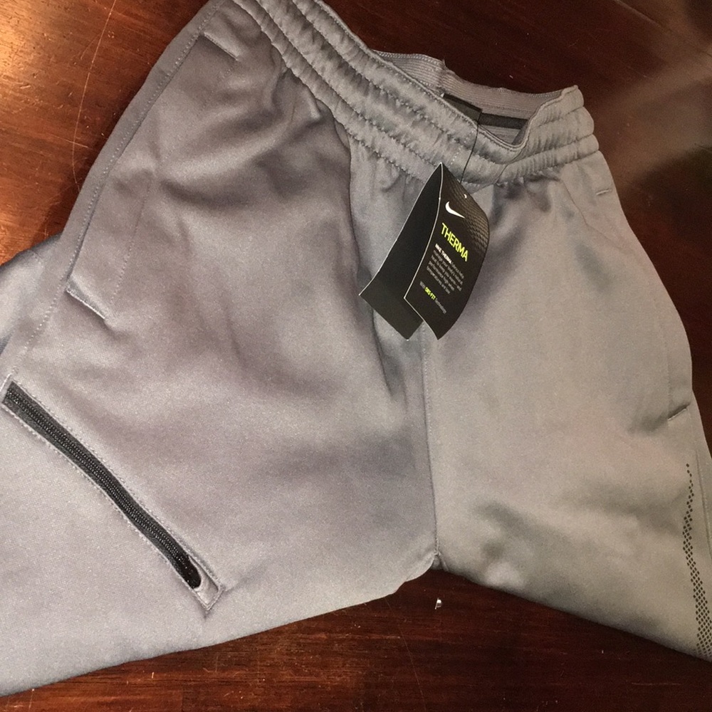 Grey Nike sweatpants